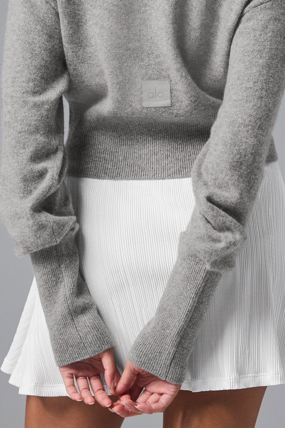 Relaxed-fit cropped cardigan worn during city stroll in dove grey heather.