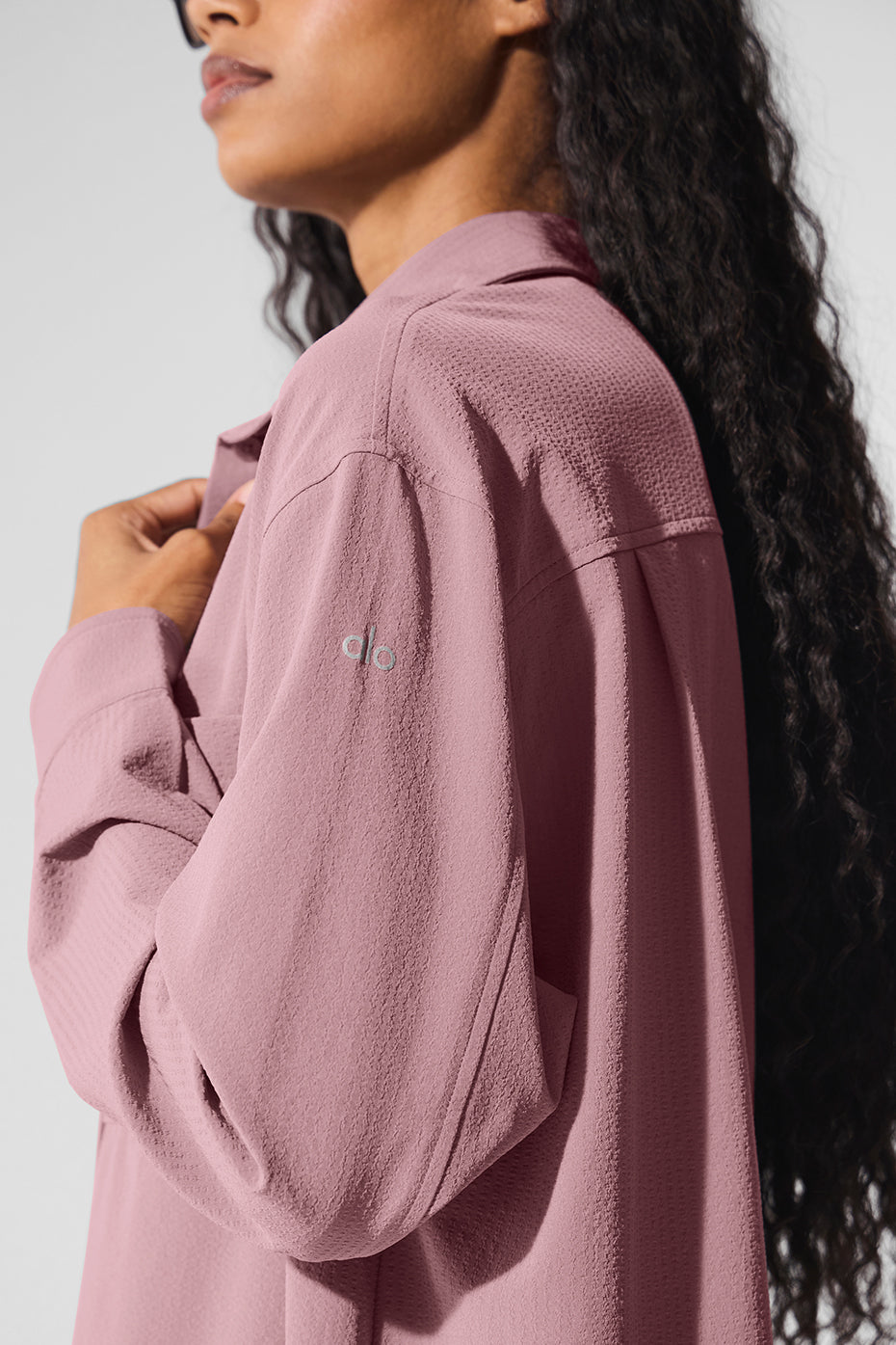 Dreamscape oversized button down shirt draped on a hanger