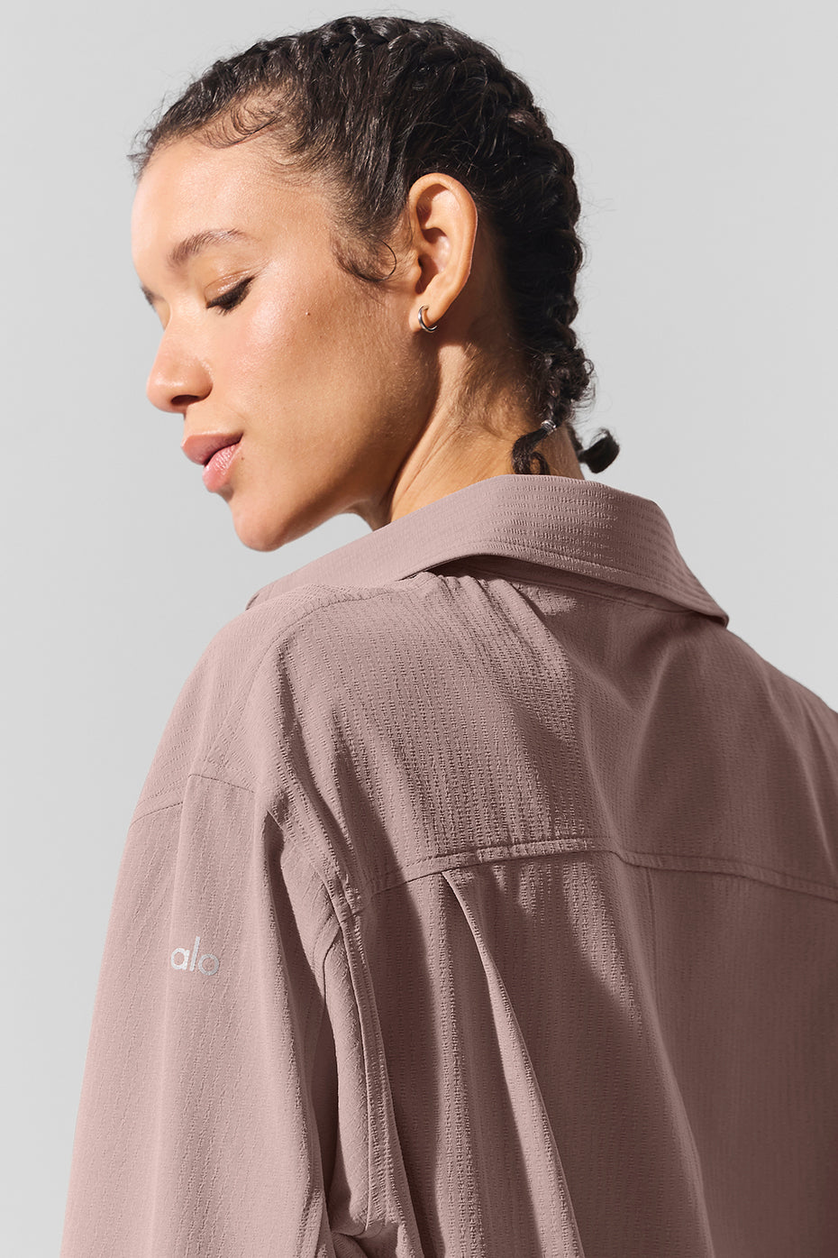 Close-up of the breathable crinkle woven fabric of the Dreamscape oversized blouse.