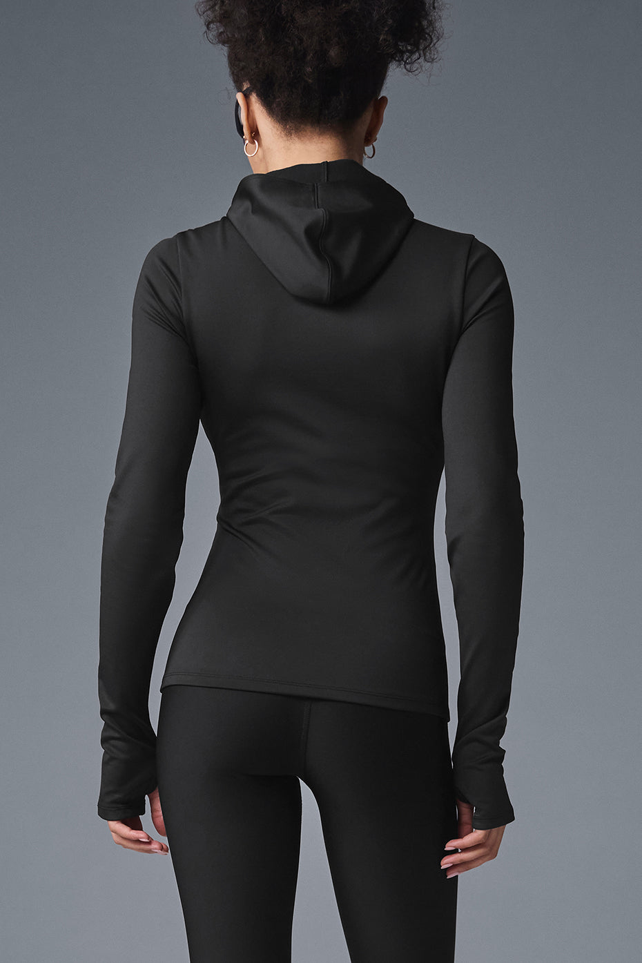Side view of running jacket showing sleek, tailored fit for movement
