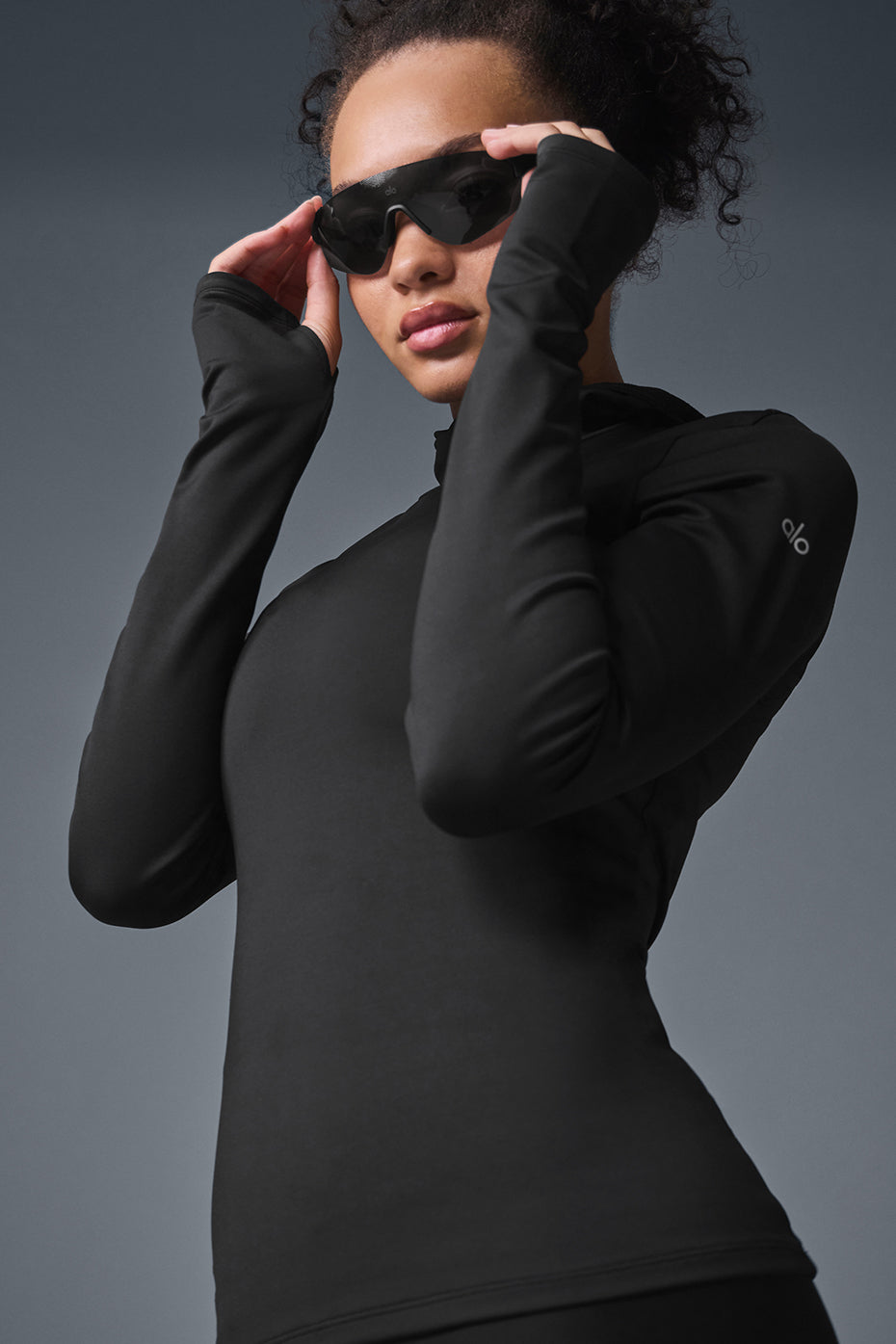 Side view of running jacket showing sleek, tailored fit for movement