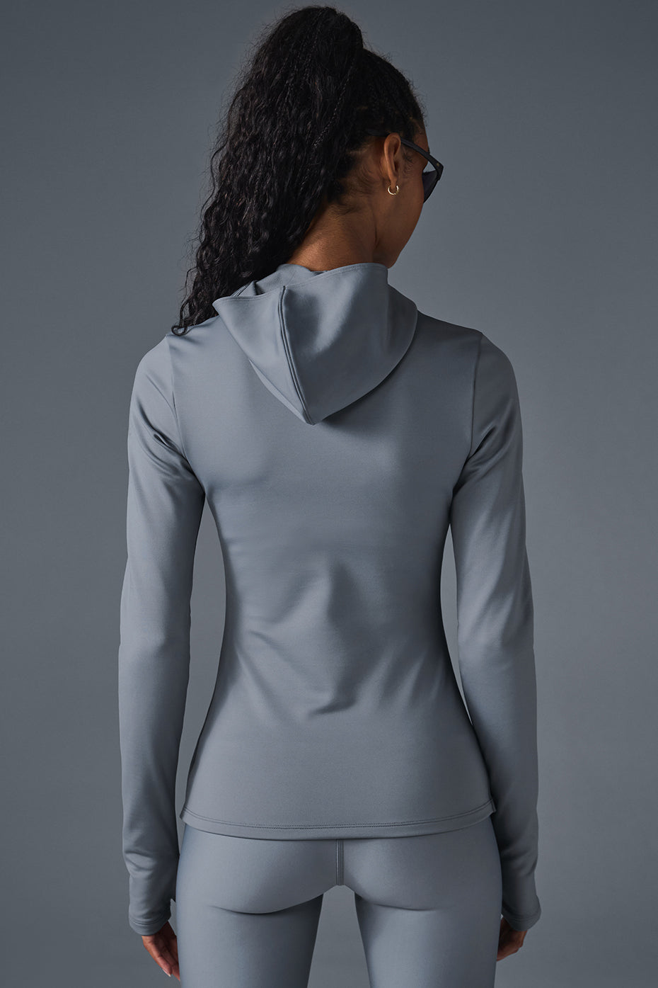Model wearing the Airlift winter running jacket on a frosty morning run.