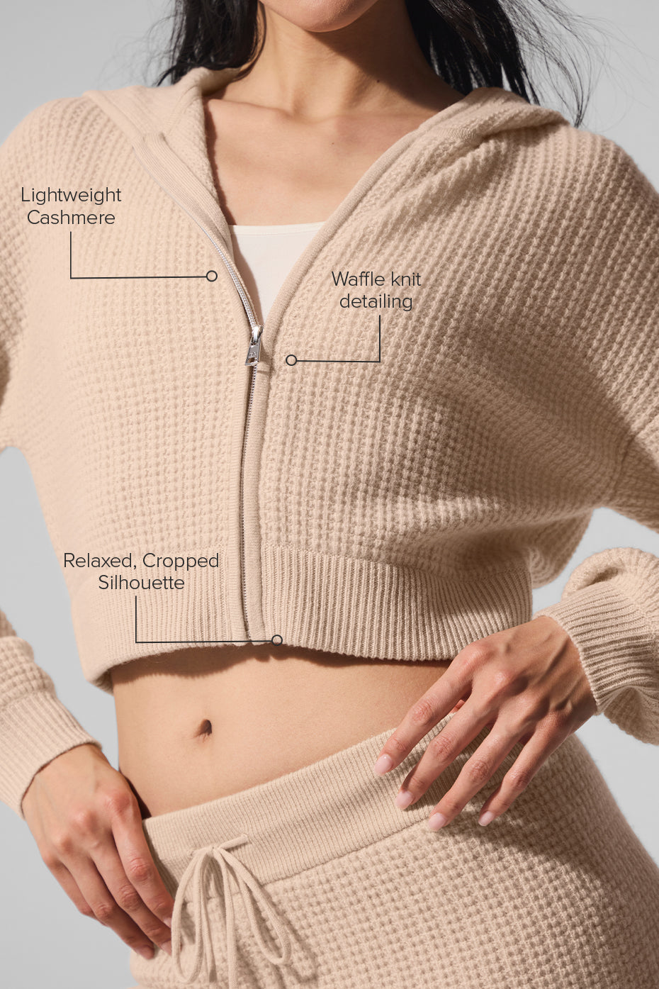 Model wearing the ladies cashmere hoodie sweater with full zip front