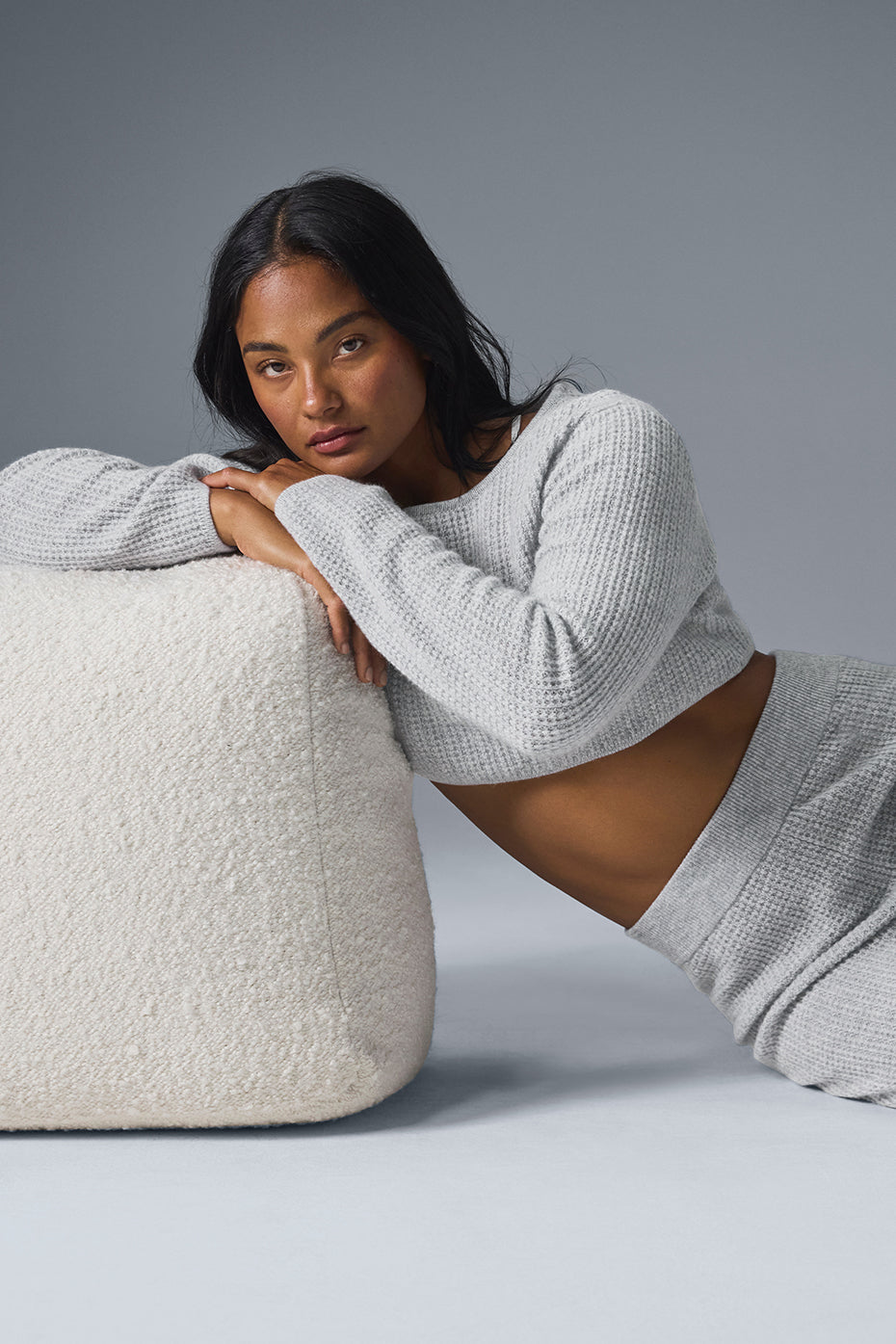 Close-up of cashmere waffle cropped top in athletic grey, showcasing texture and fit.
