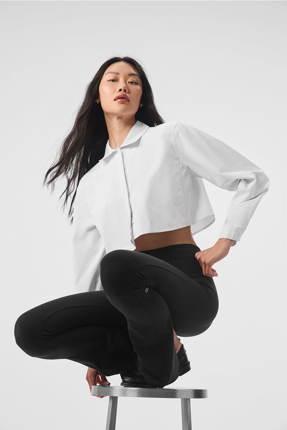 Chic white cropped button-up shacket styled with a crop shirt top.