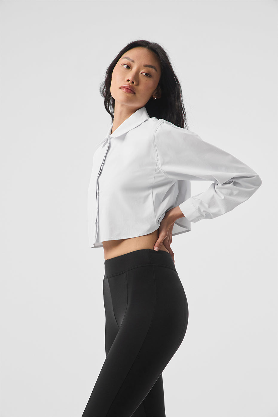 Chic white cropped button-up shacket styled with a crop shirt top.