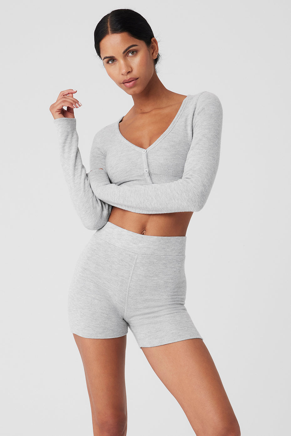 Front view of Alolux cropped cardigan in grey with button details