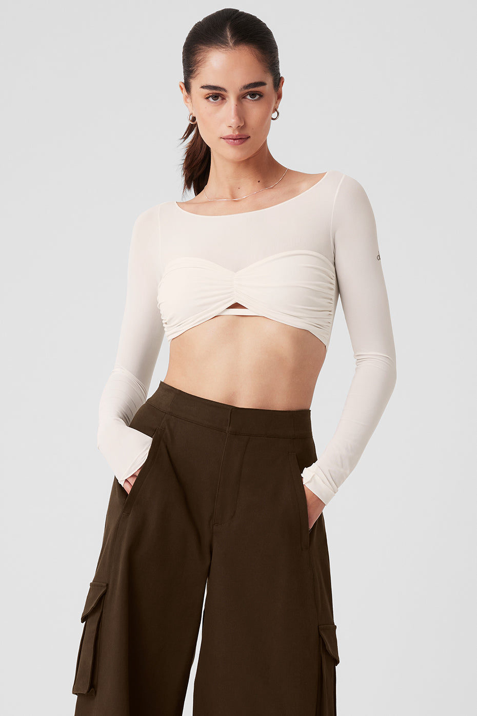 Ivory mesh crop top styled in a balletcore fashion.