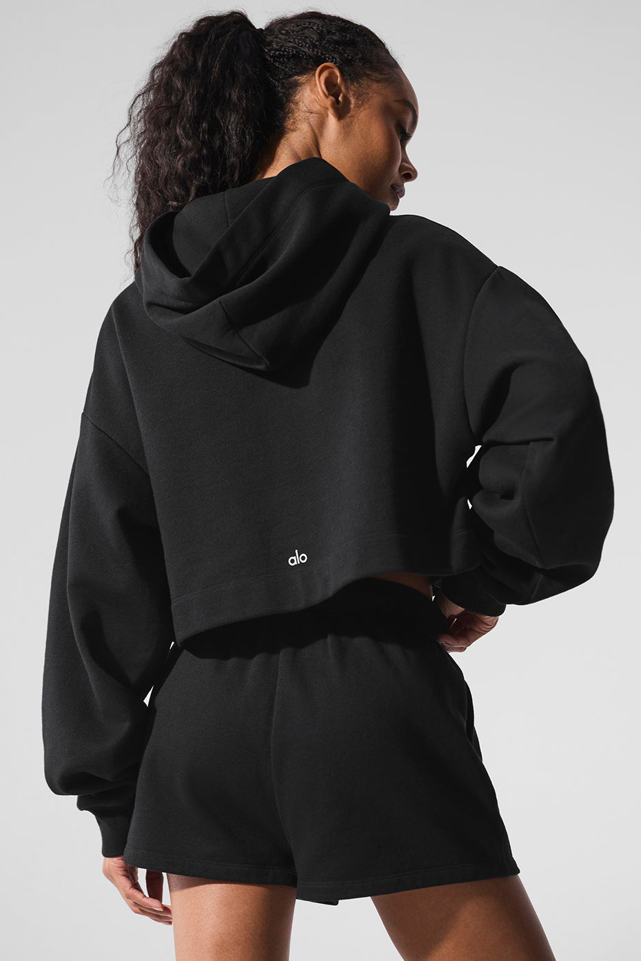 Close-up of fleece lining and ribbed cuffs on womens sweatshirt.