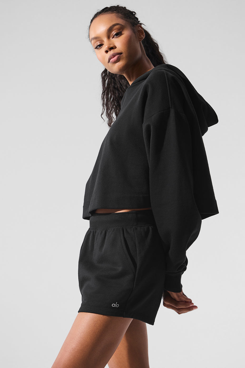 Casual outfit pairing hoodie with a maxi dress for relaxed style.