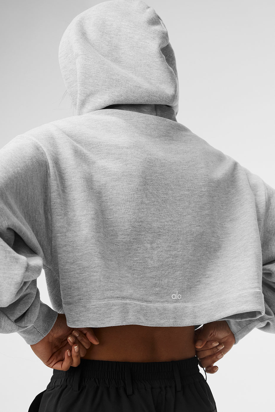 Side view of the Chic Comfort Hoodie, highlighting the scrunchable sleeves and ribbed cuffs.