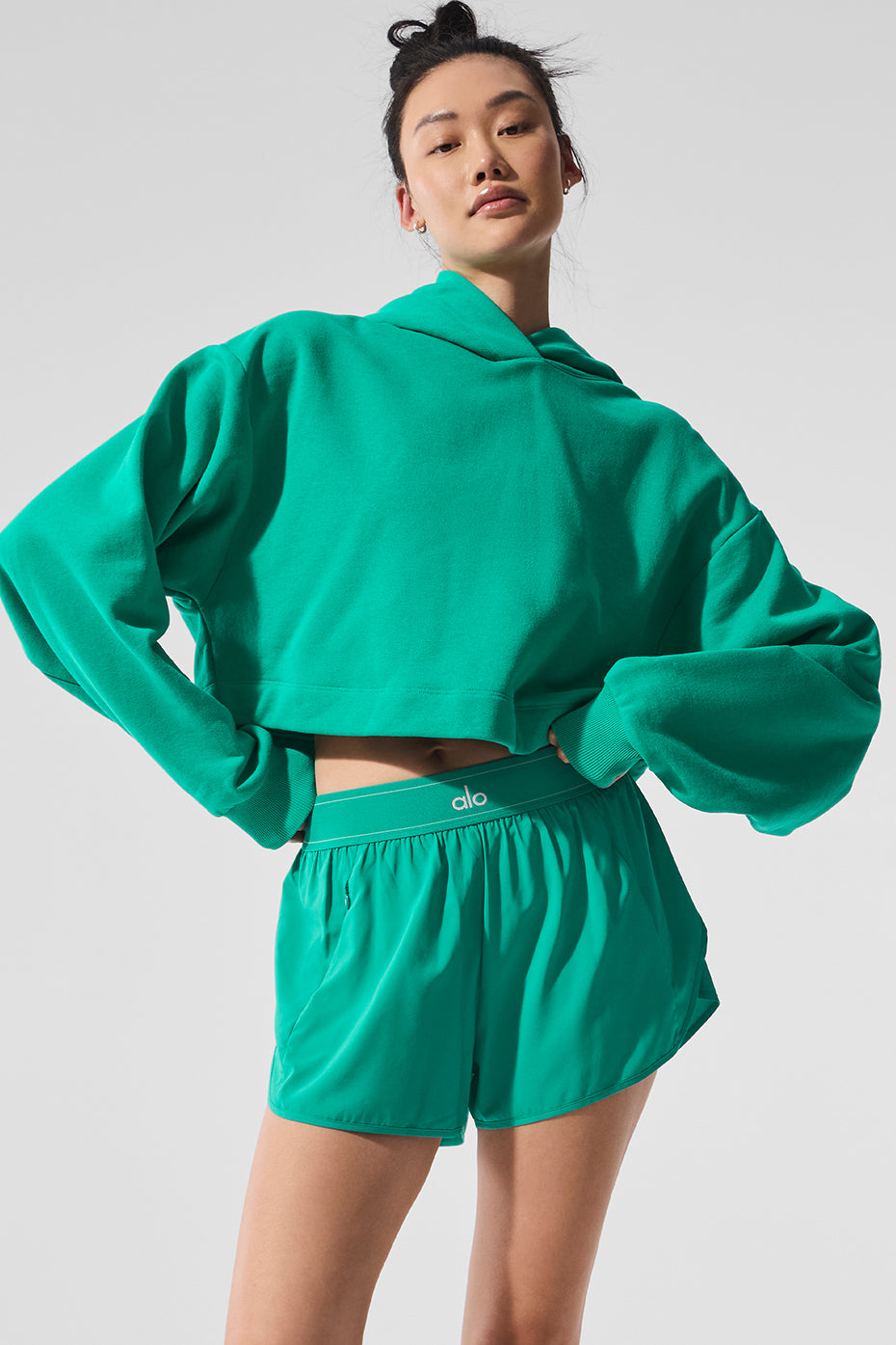 Front view of the Spruce Green comfort hoodie, showcasing its relaxed fit.