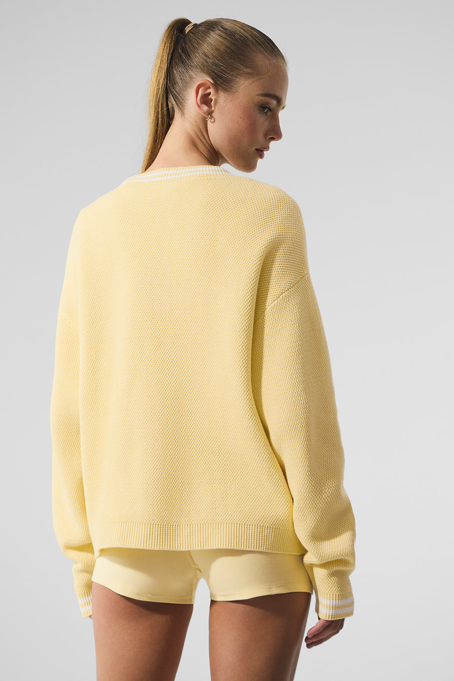 Model wearing womens cable knit sweater ralph lauren inspired look outdoors
