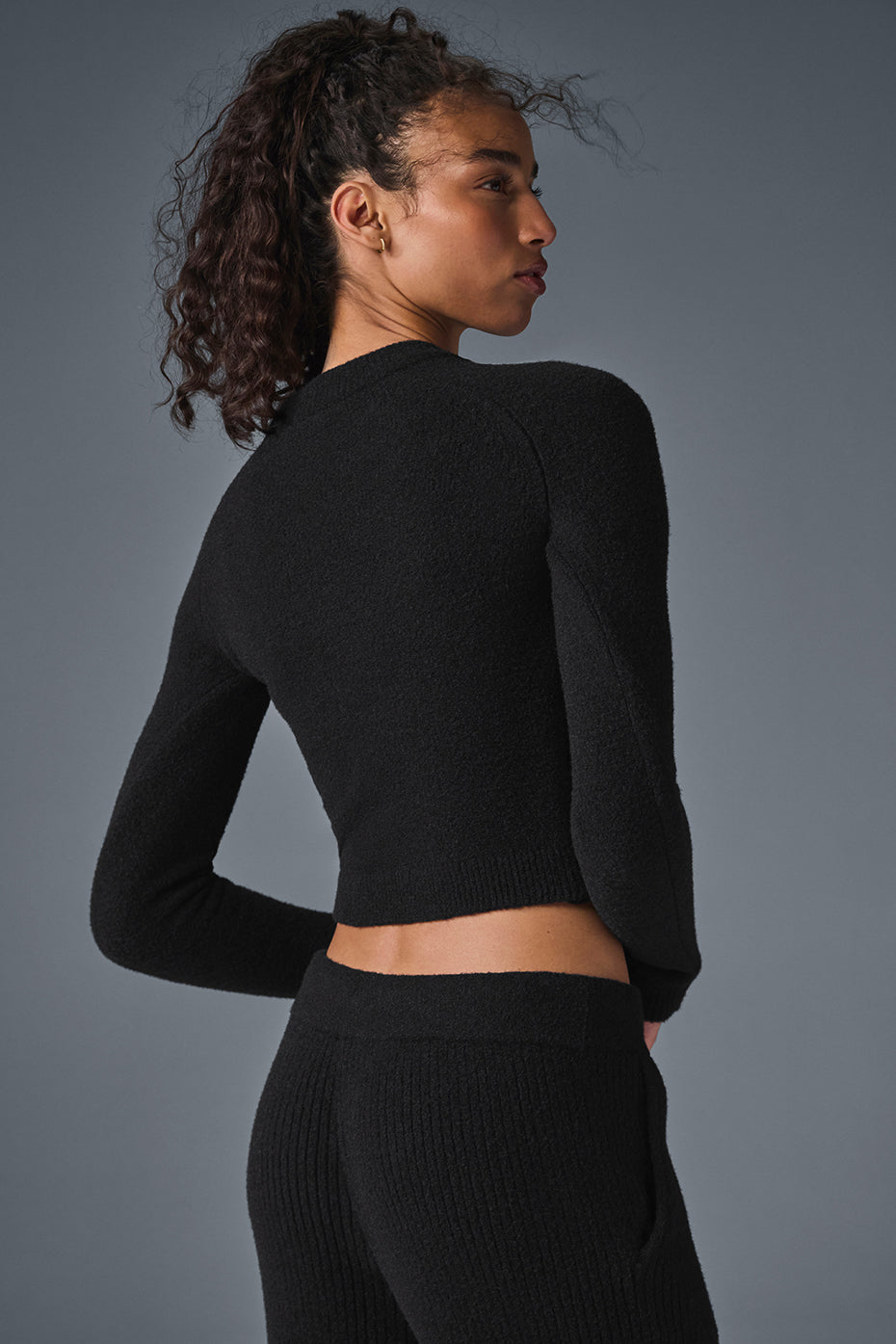 Close-up of the soft fabric of the cropped cardigan sweater.
