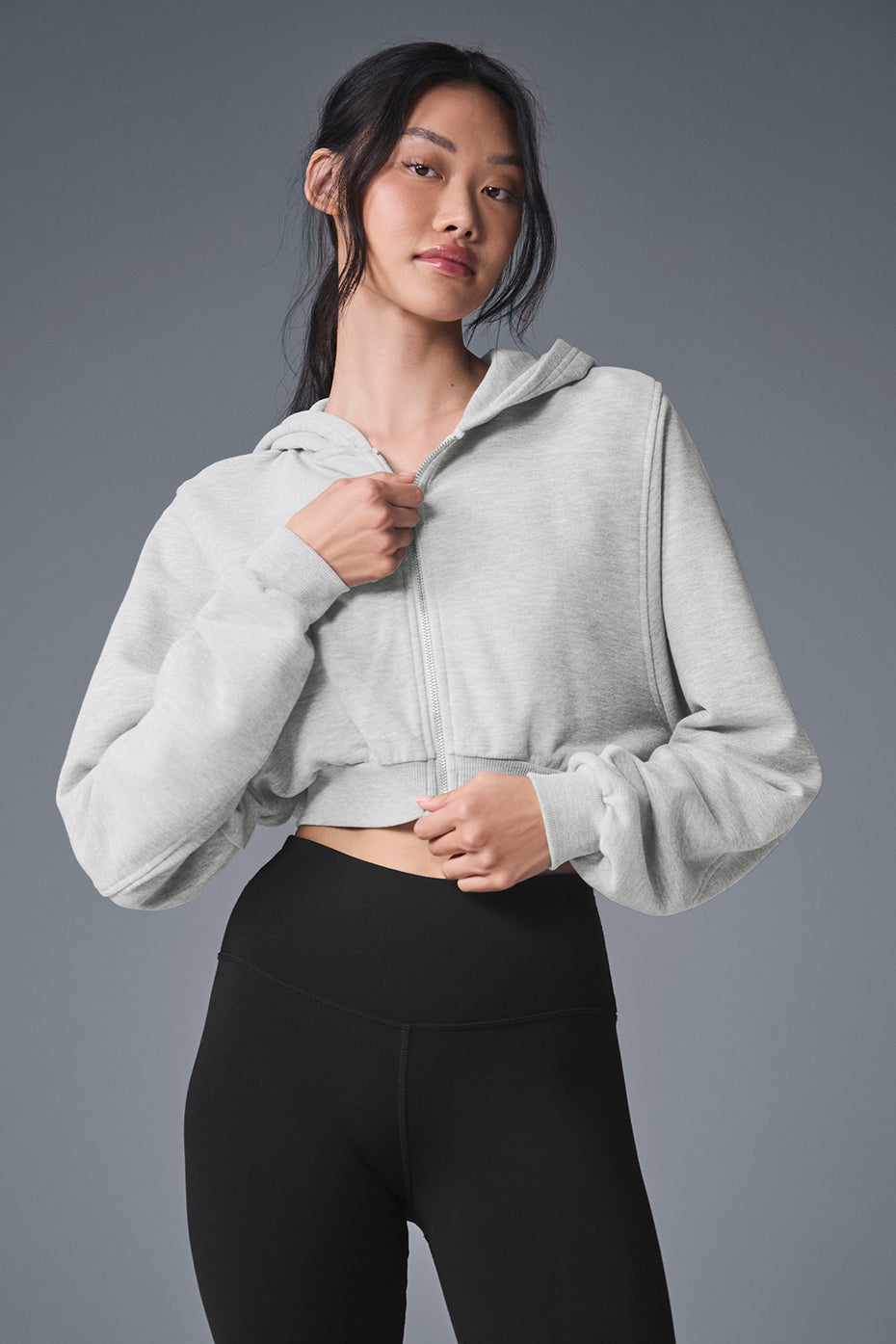 Person wearing the athletic hoodie outdoors, perfect for active lifestyles