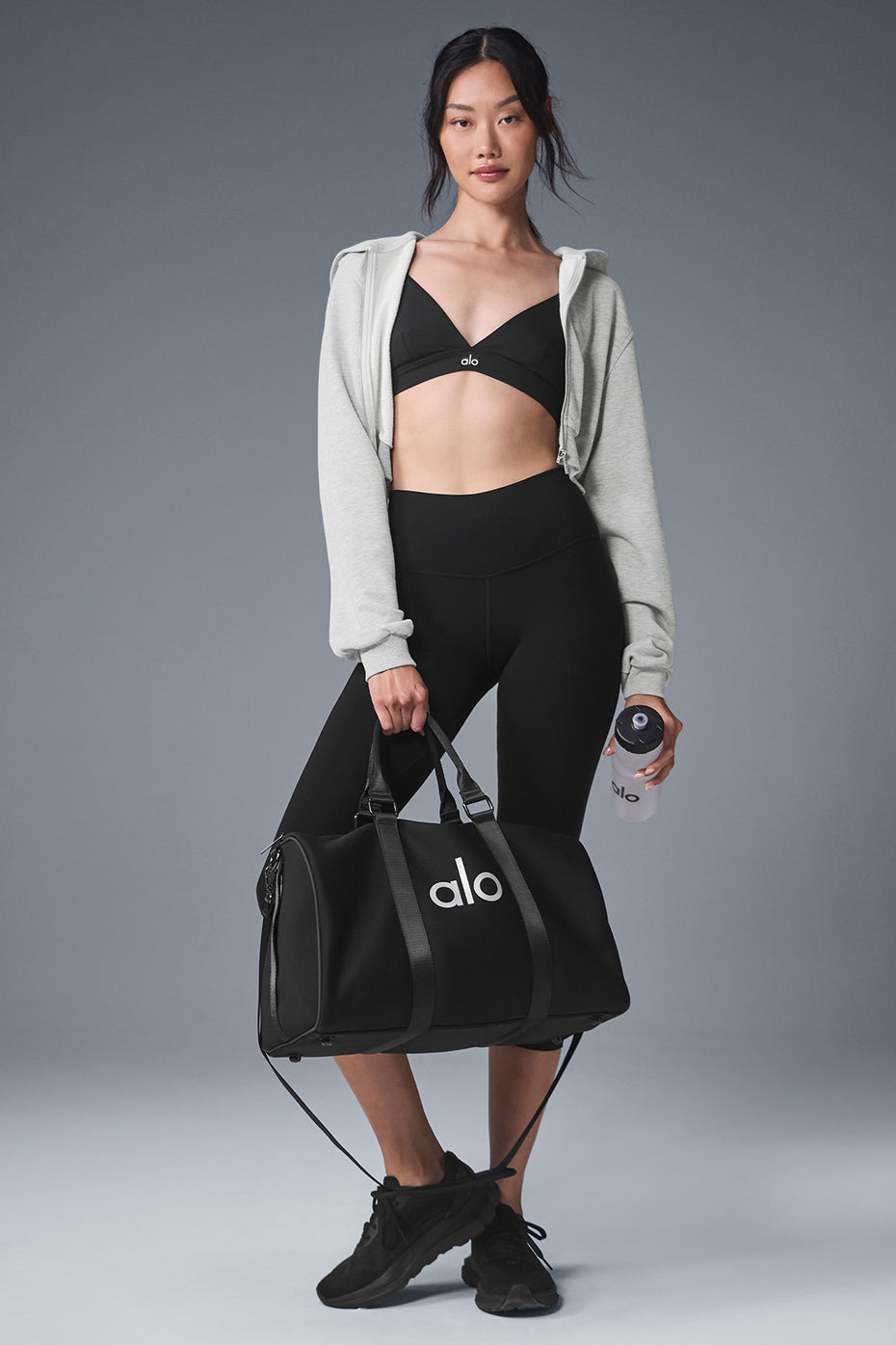 Person wearing the athletic hoodie outdoors, perfect for active lifestyles