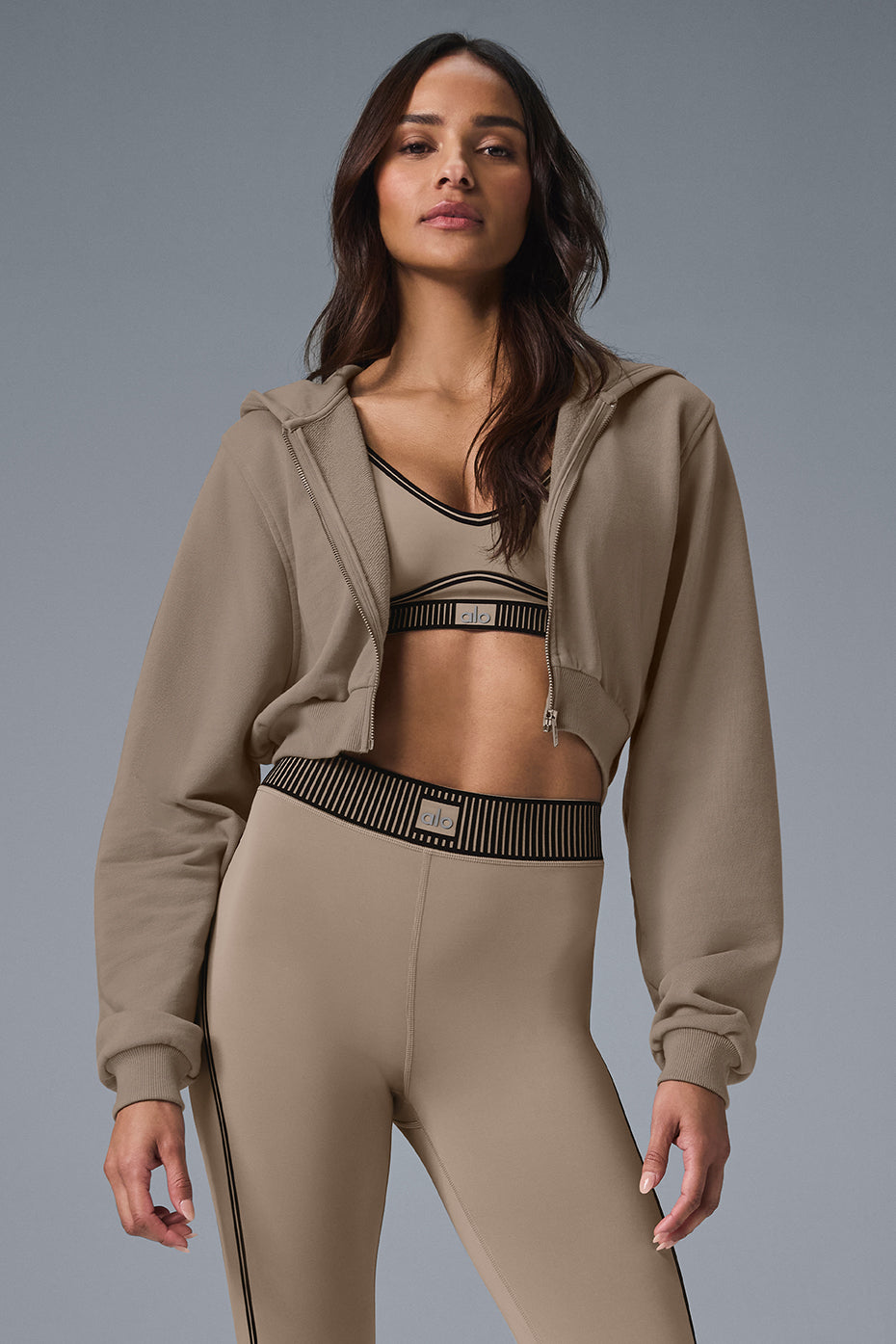 Close-up of the ribbed cuffs and seamed details on the hoodie