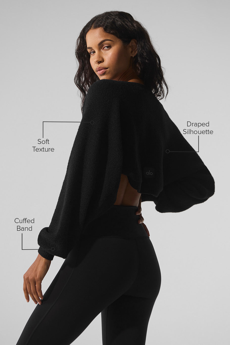 Side view of the cozy wrap black cardigan for casual outings.