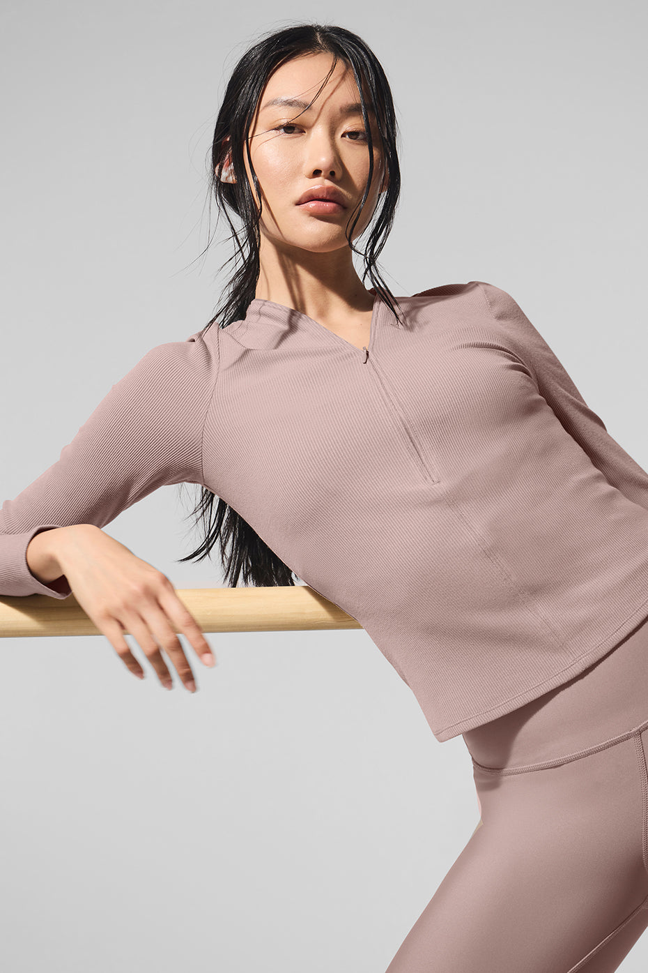 Taupe ribbed mesh long sleeve top styled with high-waisted jeans