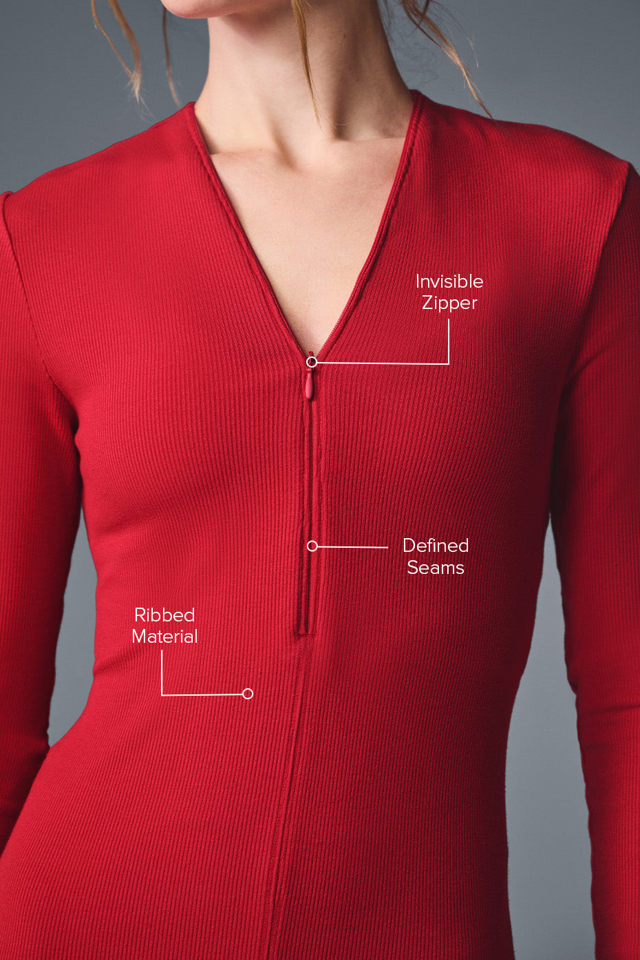 Side profile of ribbed shirt showing close-to-body fit under jacket