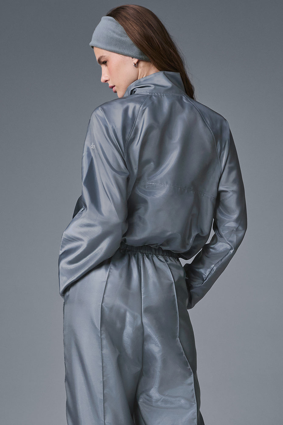 Side view of the Cropped Afterglow Pullover, highlighting its stylish waist-grazing fit.