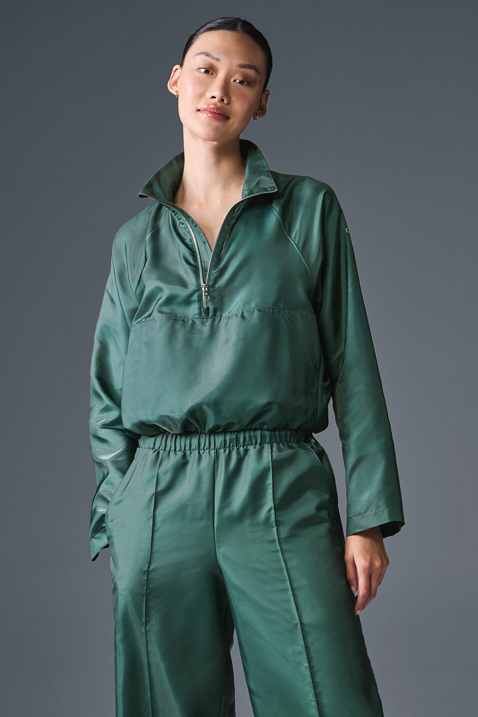 Styled shot of the pullover paired with casual jeans for a street-ready look