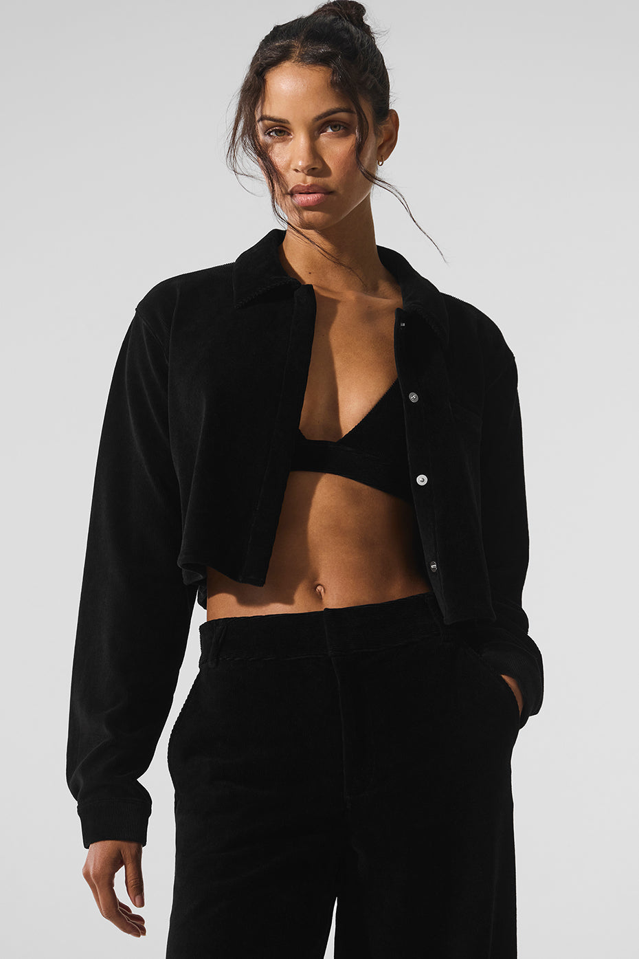 Front view of cropped corduroy dreamer button down shirt in black.