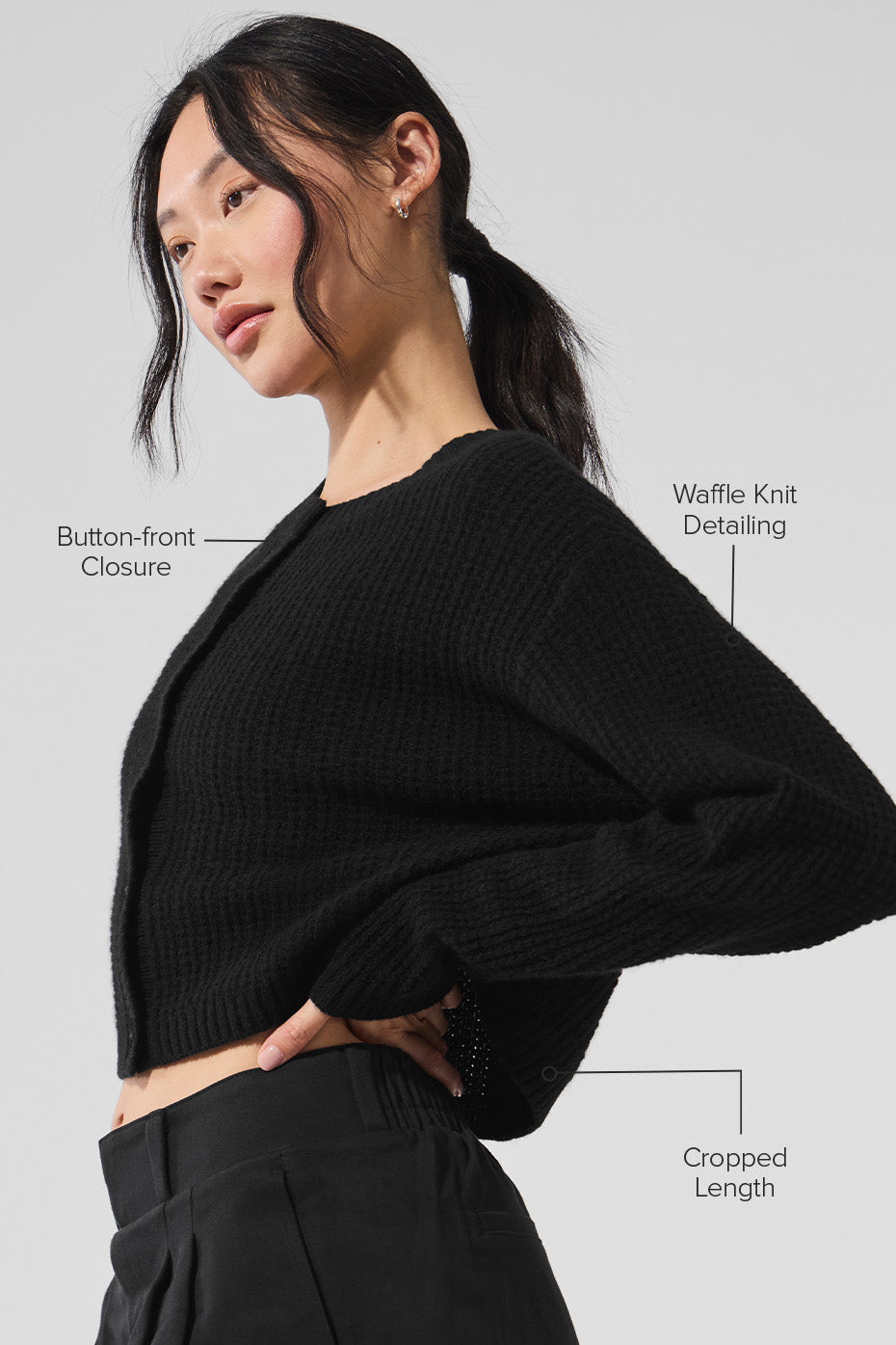 Close-up of plush waffle cardigan fabric texture
