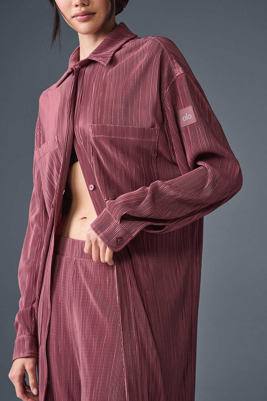 Close-up of the button details on the burgundy shirt dress.