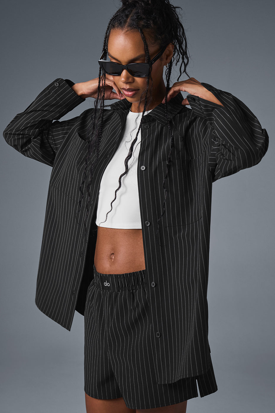 Front view of oversized button down shirt in black and titanium, perfect for office attire.
