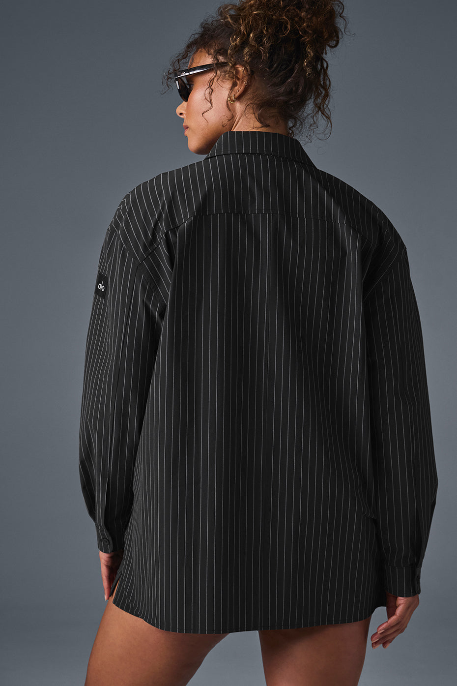Front view of oversized button down shirt in black and titanium, perfect for office attire.