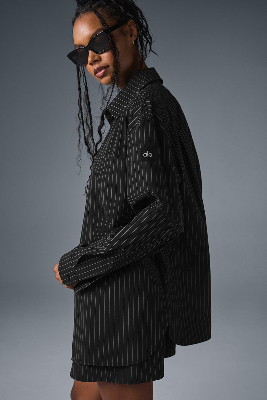Close-up of classic collar on oversized shirt, highlighting its sophisticated design.