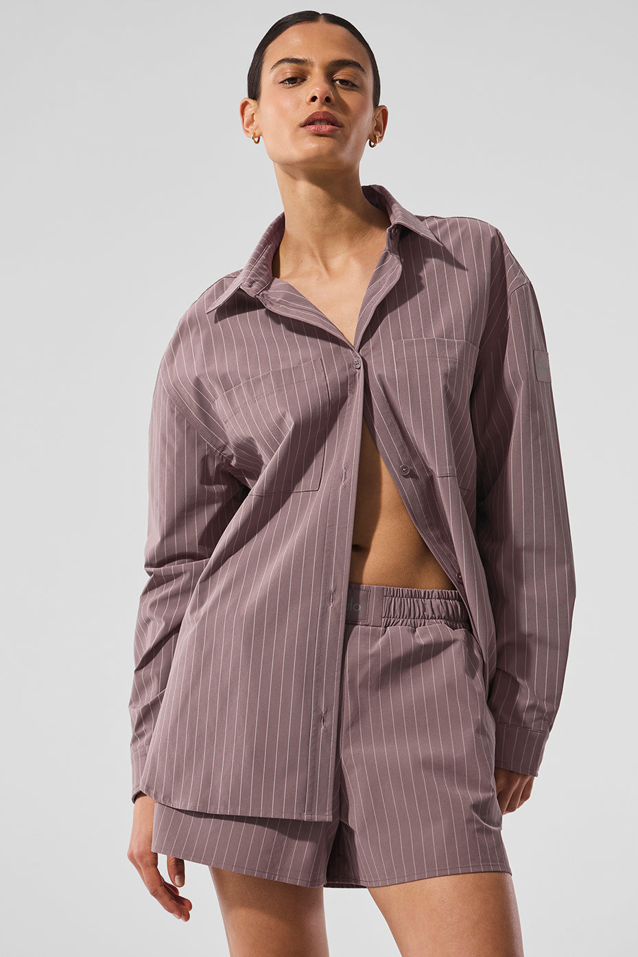 Front view of Mushroom/Ivory oversized button down shirt on a model.