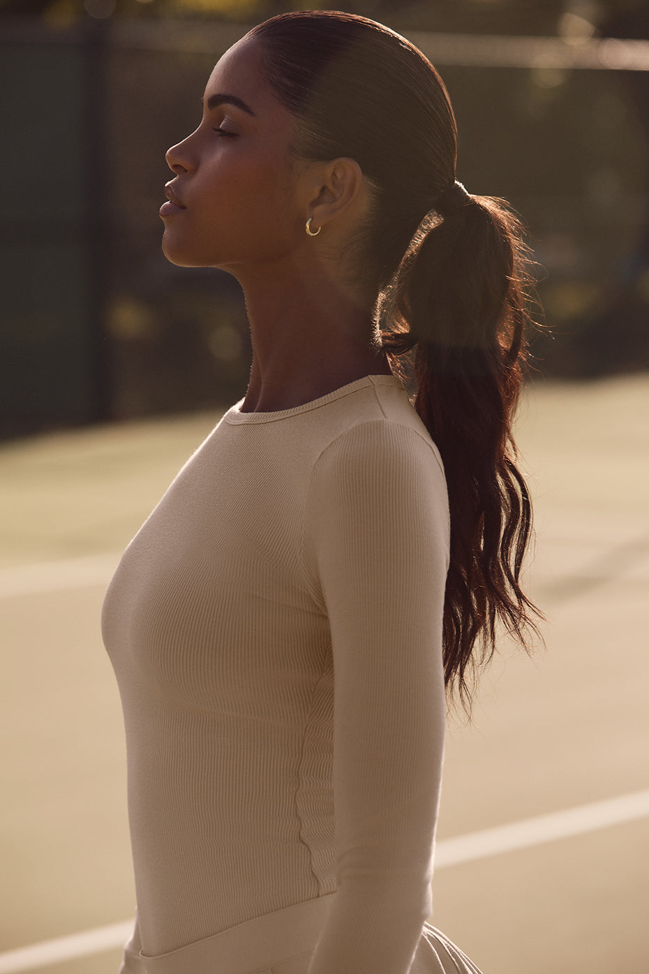 Front view of the women's ribbed long sleeve top in Macadamia.