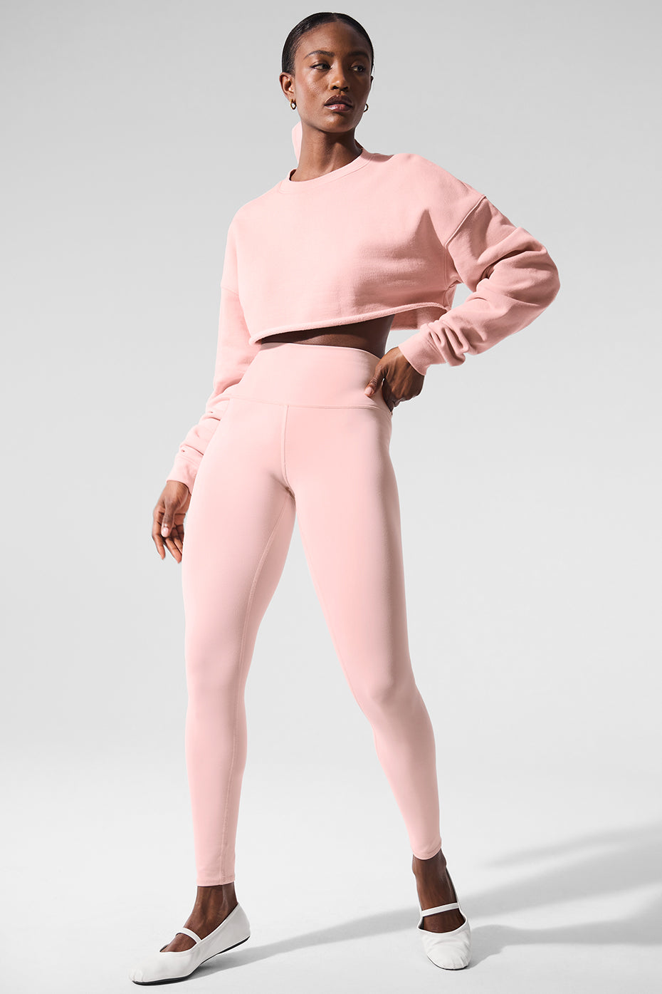 Front view of the pink quartz cropped pullover sweatshirt.