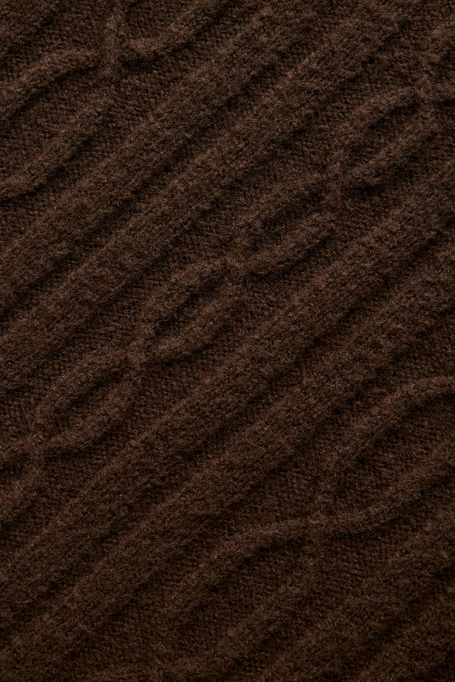 Back view of turtleneck sweater draped over shoulders