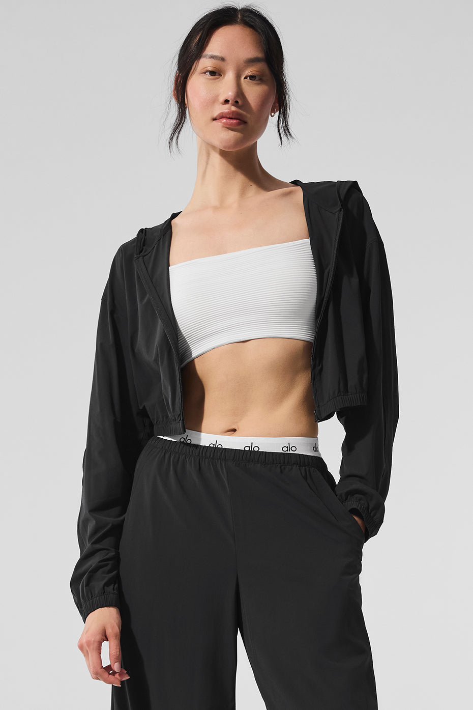 Front view of the Chic Cropped Full-Zip Hoodie in black, showcasing design.