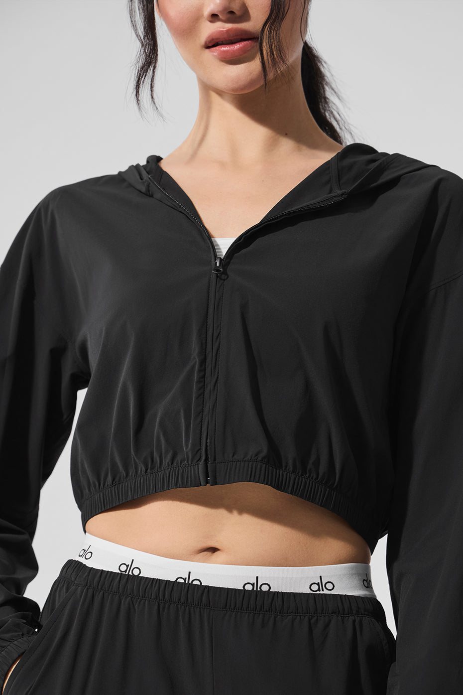 Front view of the Chic Cropped Full-Zip Hoodie in black, showcasing design.