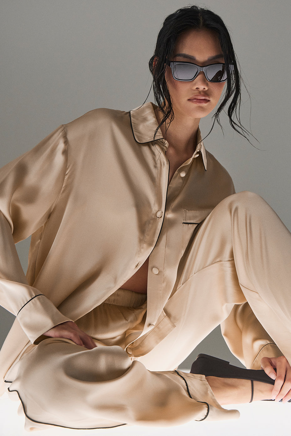 Front view of Courchevel luxury silk button down shirt in champagne and black.