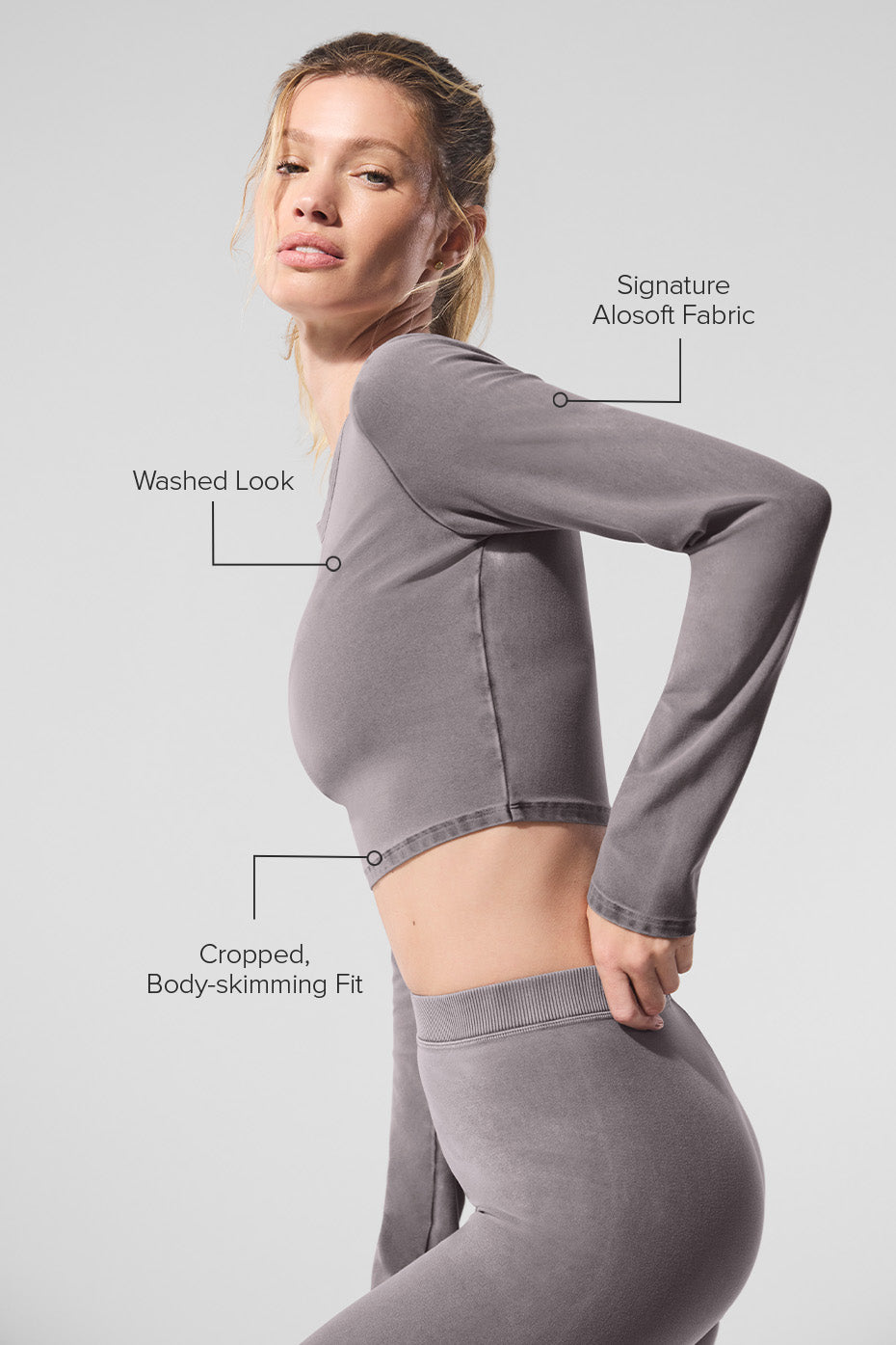 Side view showcasing the cropped silhouette of the long sleeve shirt.