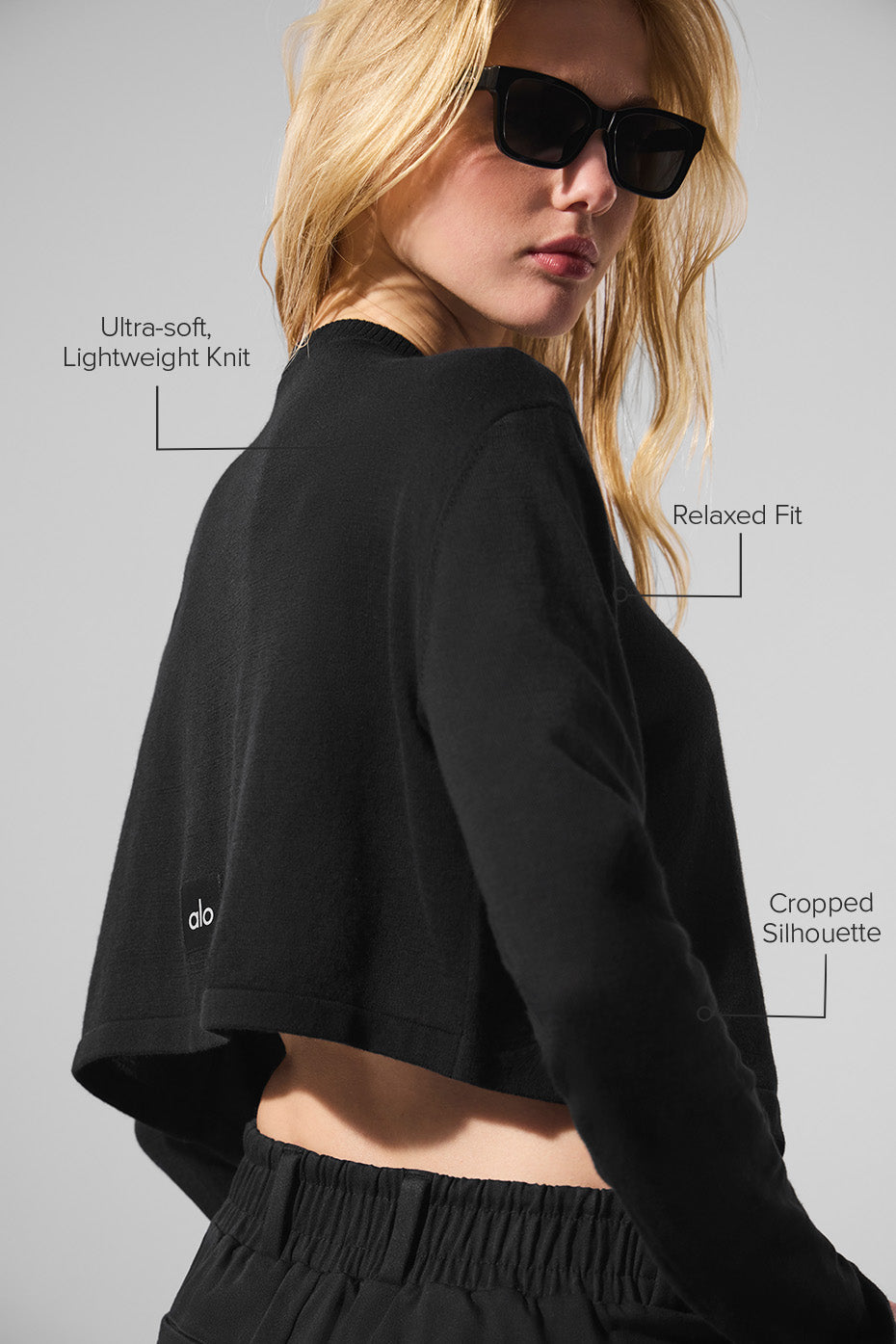 Close-up of the soft fabric of the lightweight cardigan, showcasing its quality.