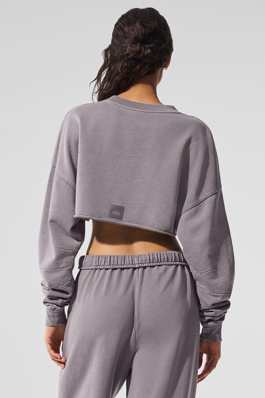 Front view of the chic washed extreme cropped pullover in cool grey.