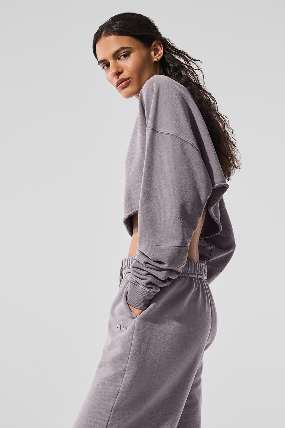 Side angle showcasing the cropped turtleneck pullovers stylish design.