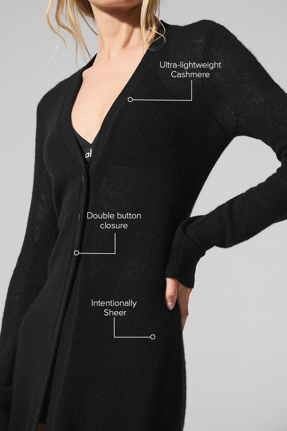Sheer cardigan styled for brunch near the Austin skyline
