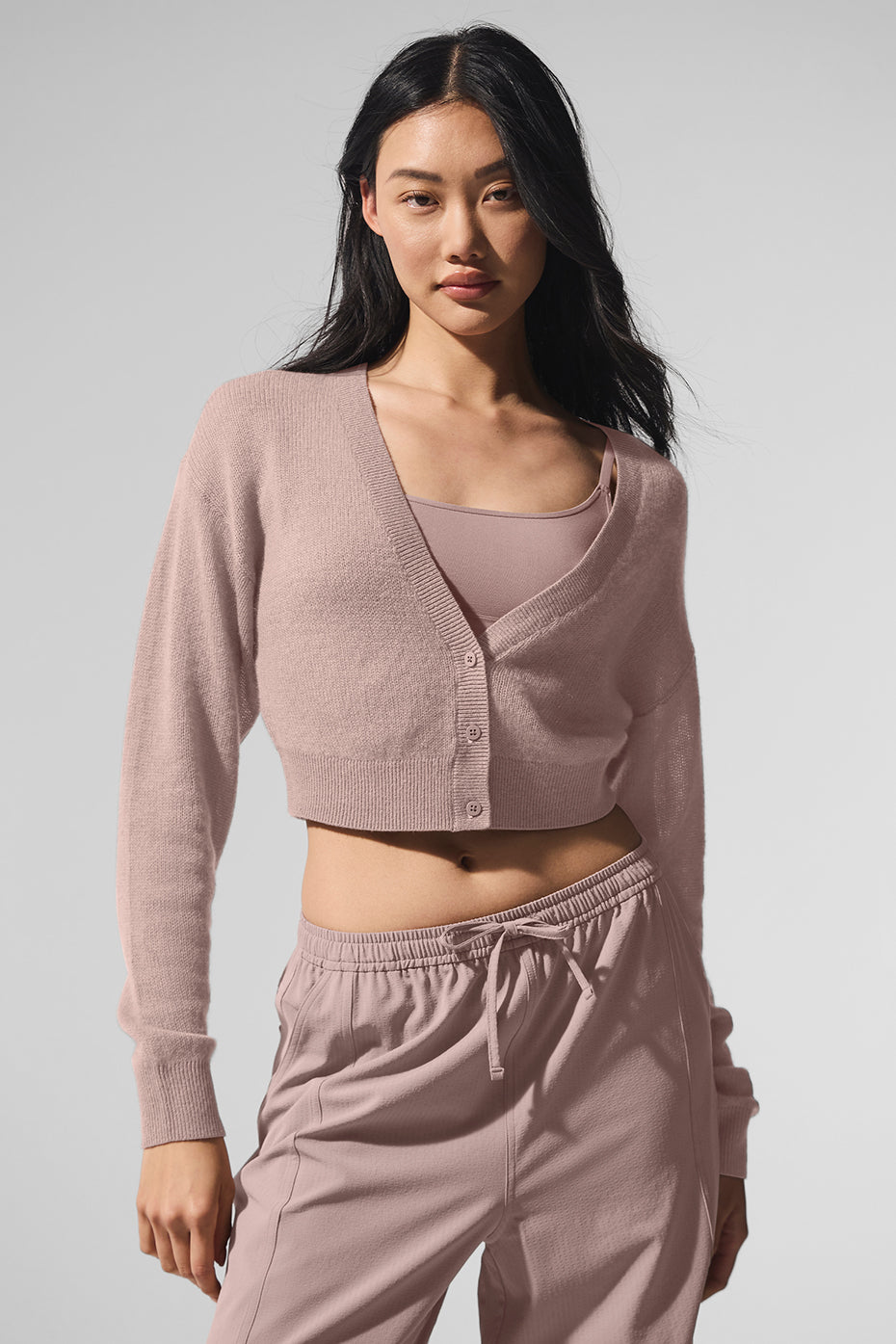 Front view of the taupe cropped cashmere cardigan, ideal for layering.