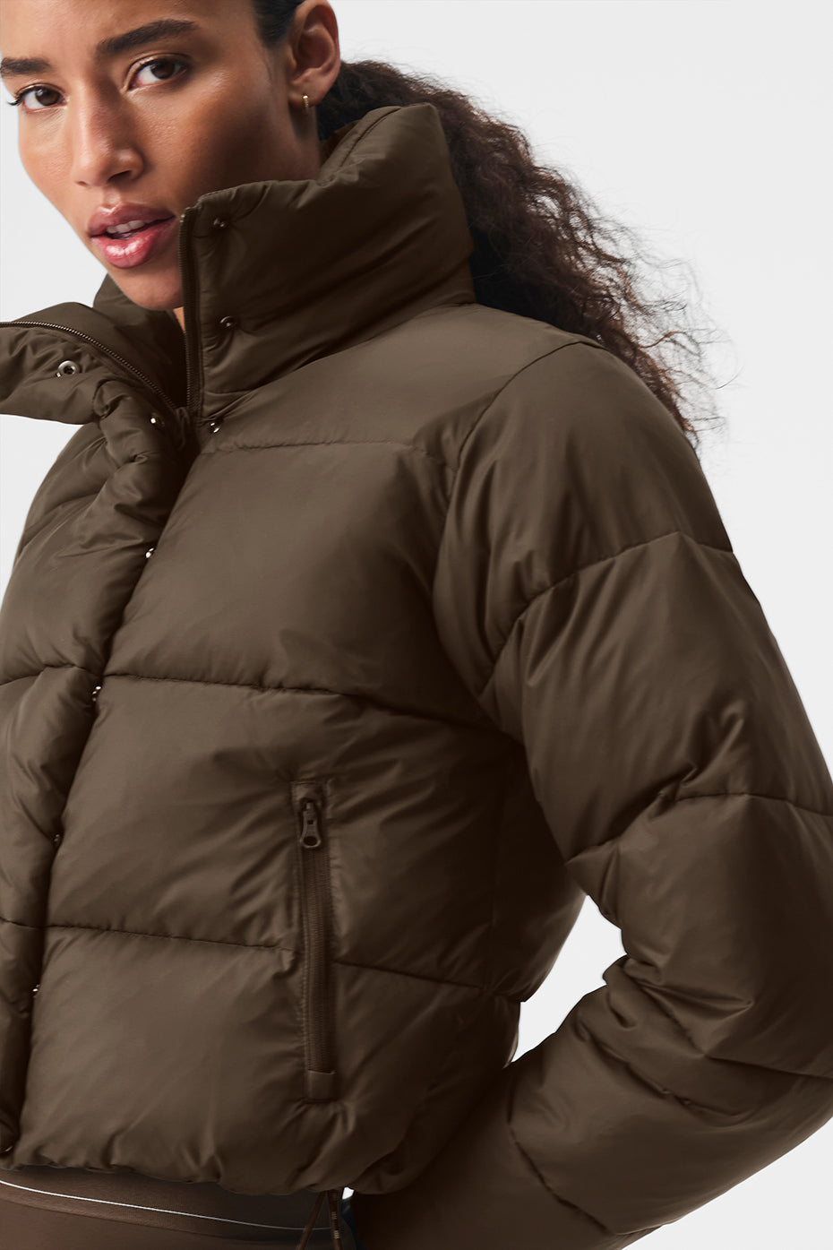 Front view of Gold Rush Puffer jacket in espresso highlighting its cropped fit and tall collar