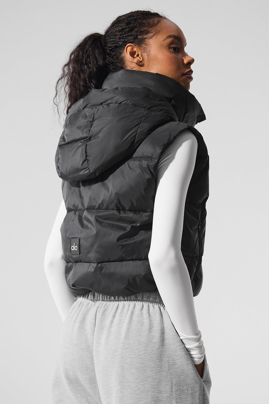 Detail shot of the vest’s fleece-lined pockets and side zippers