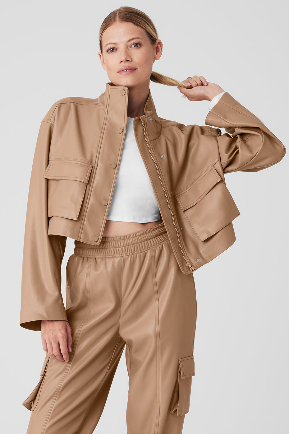Front view of the chic faux leather power hour jacket in toasted almond.