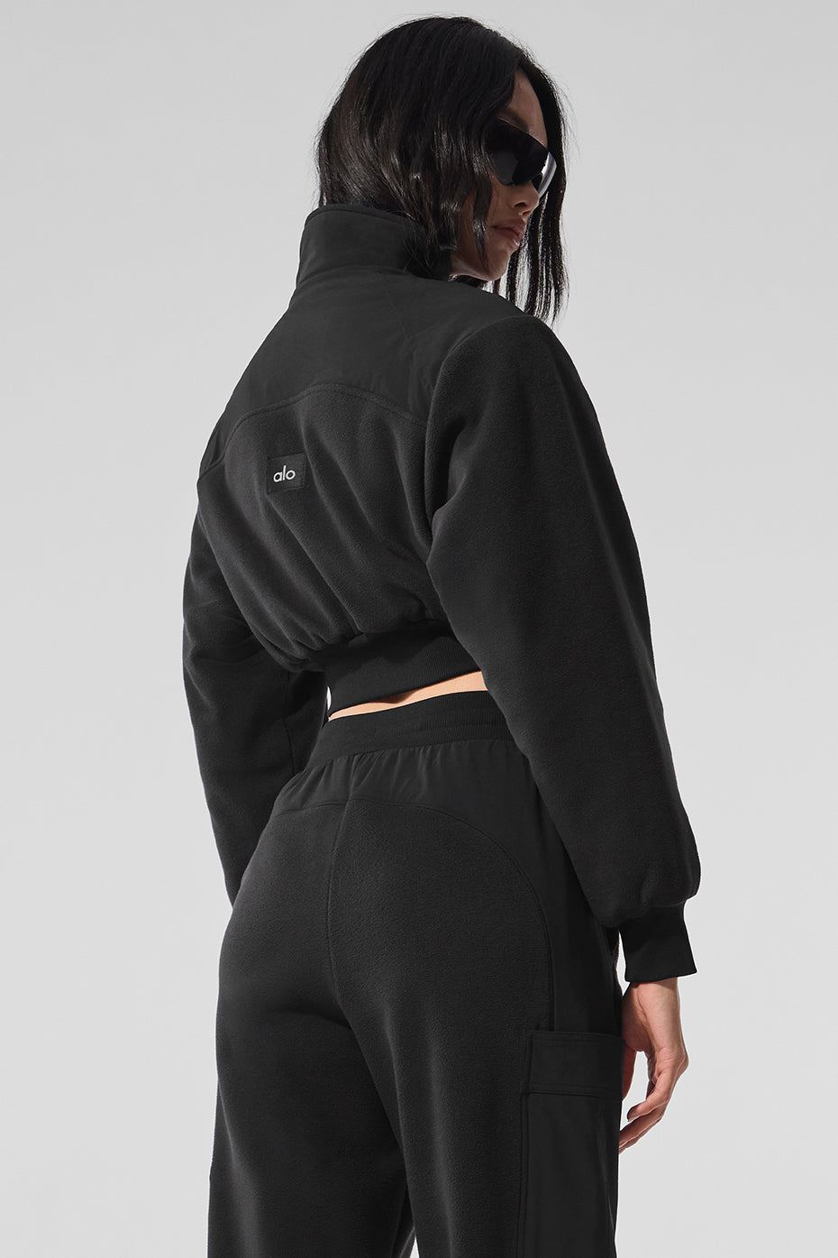 Detail shot showing fleece texture and zippered pocket