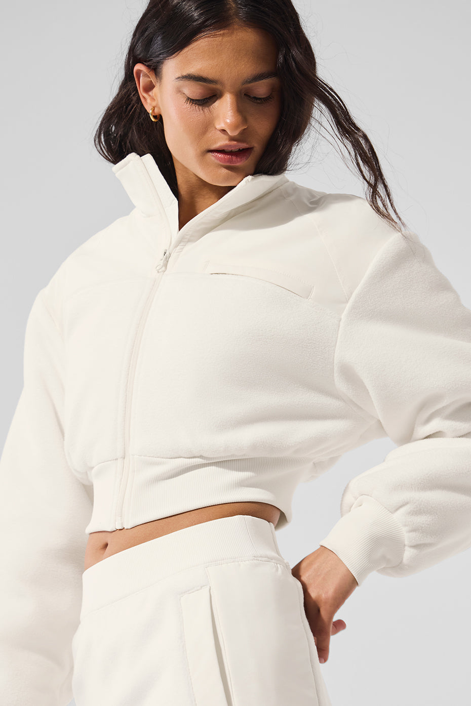 Side detail showing dropped-shoulder fit and fleece texture